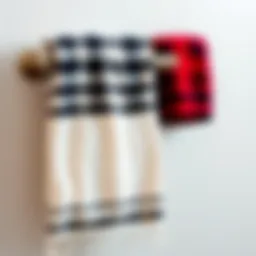 Elegant buffalo plaid bathroom towel draped over a stylish towel rack