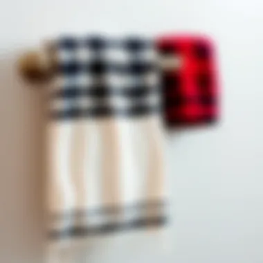Sophisticated Display of Buffalo Plaid Towels Elegant buffalo plaid bathroom towel draped over a stylish towel rack