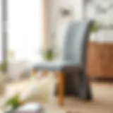 Elegant gray stretch chair cover on a modern dining chair