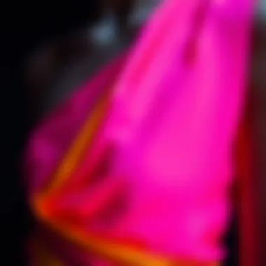 Close-up of fabric texture of neon one shoulder dress