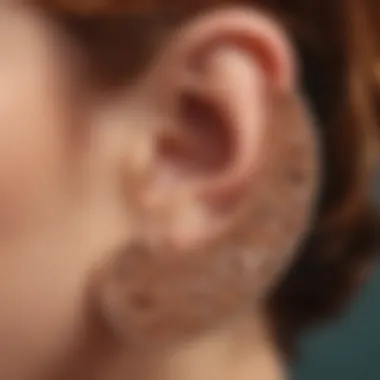 Close-up of a rose gold tunnel earring highlighting its texture