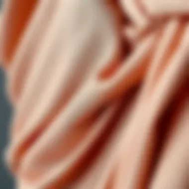 The Intricate Textures of Draped Fabrics Close-up of fabric texture used in draped asymmetrical dresses