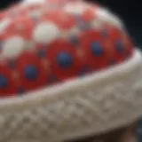 A close-up of a beautifully crafted crochet cap showcasing intricate patterns and textures.