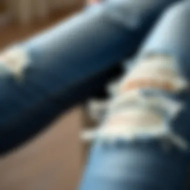 Close-up of the fabric texture of maternity ripped skinny jeans