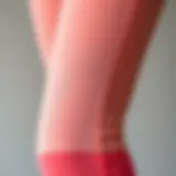 Fabric Detail of Peach Booty Leggings Close-up view of peach booty leggings showcasing fabric texture and design