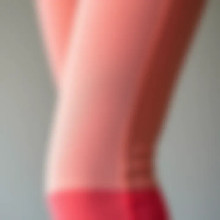 Fabric Detail of Peach Booty Leggings Close-up view of peach booty leggings showcasing fabric texture and design