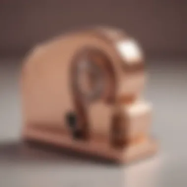 Close-up of rose gold tape dispenser highlighting its design features