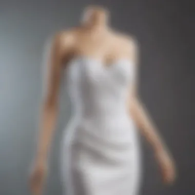 Elegant white bandeau dress displayed on a mannequin