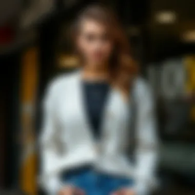 Stylish Draping of a Cable Knit Cardigan A stylishly draped cable knit cardigan over a contemporary outfit