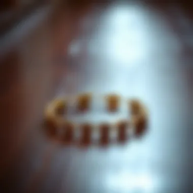 Elegant Paw Print Ankle Bracelet Elegant paw print ankle bracelet on a wooden surface