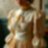 Elegant vintage dress showcasing intricate embroidery and fabric details